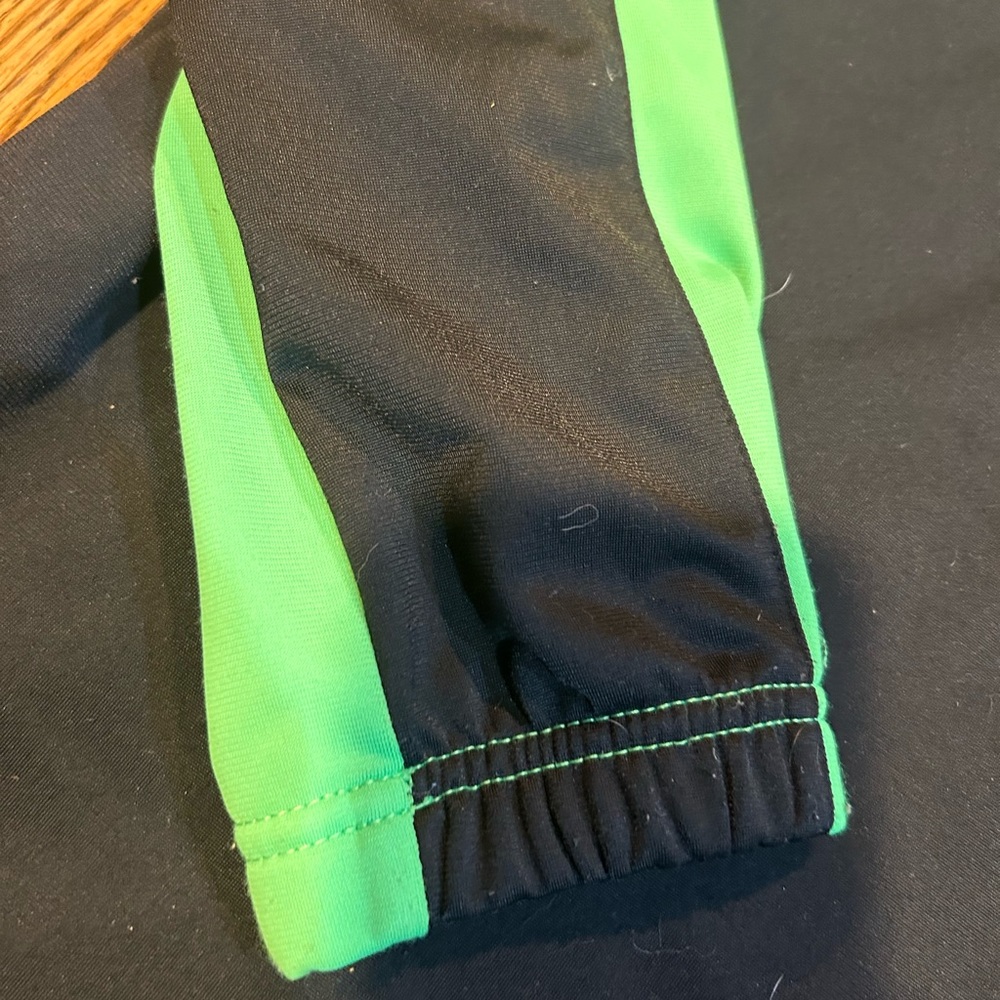 Nike track jacket. Part of a jogger set. Pants left in a hotel on vacation.